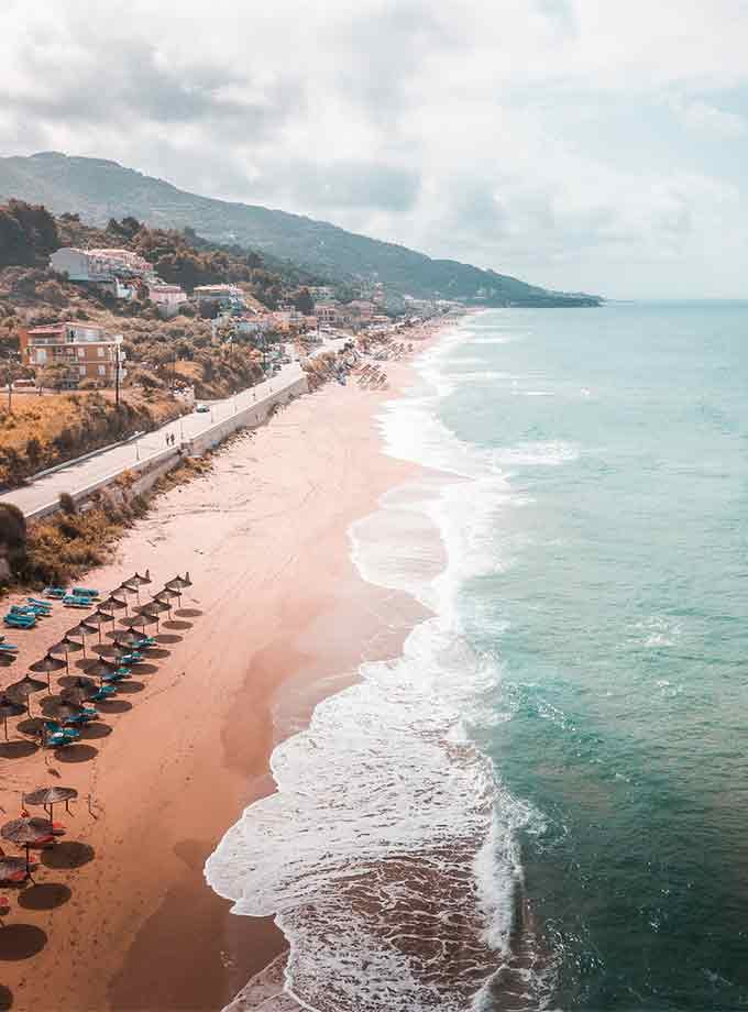 Aerial view of Monolithi Beach in Preveza, Greece – long sandy coast and crystal waters, featured by TicketSeller