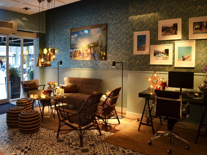 Lobby and reception area of Hotel Beethoven Amsterdam, a boutique hotel with modern decor and comfortable spaces in Amsterdam, Netherlands.