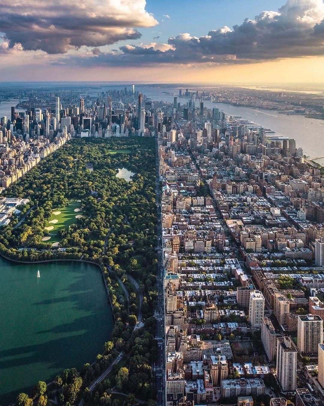 Aerial view of New York City skyline at sunset, featuring Central Park and surrounding skyscrapers