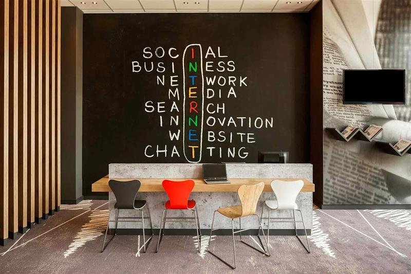 Modern workspace at ibis Berlin Spandau with stylish seating and innovative decor