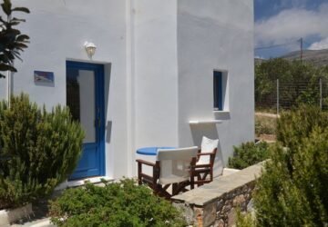 Traditional Cycladic-style exterior with a garden at Amorgion Hotel in Amorgos, Greece