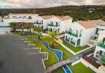 Latchi Escape Hotel and Suites aerial view of hotel facilities and swimming pool