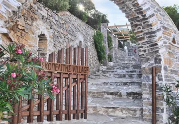 Entrance gate and traditional stone architecture of Skopelitis Village in Amorgos, Greece