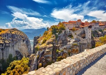 Panoramic view of Meteora monasteries and rock formations during the Full Day Tour from Thessaloniki